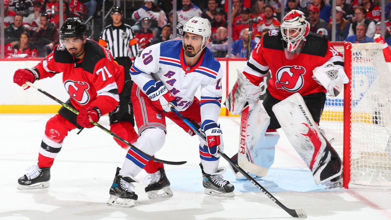 Rangers use two-goal swing to key OT win over Devils