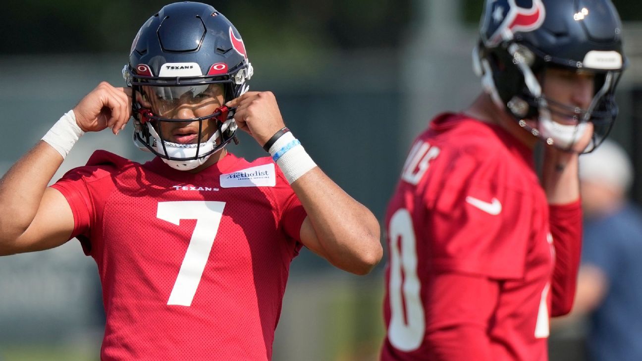 HOUSTON, TX - AUGUST 03: Houston Texans quarterback Davis Mills (10)  prepares to handoff during the Houston Texans Training Camp session at  Houston Methodist Training Center adjacent to NRG Stadium on August