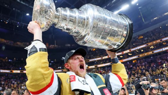 Jack Eichel lifting Stanley Cup