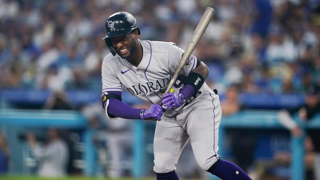 Rockies' Jurickson Profar injured after slamming into Dodger