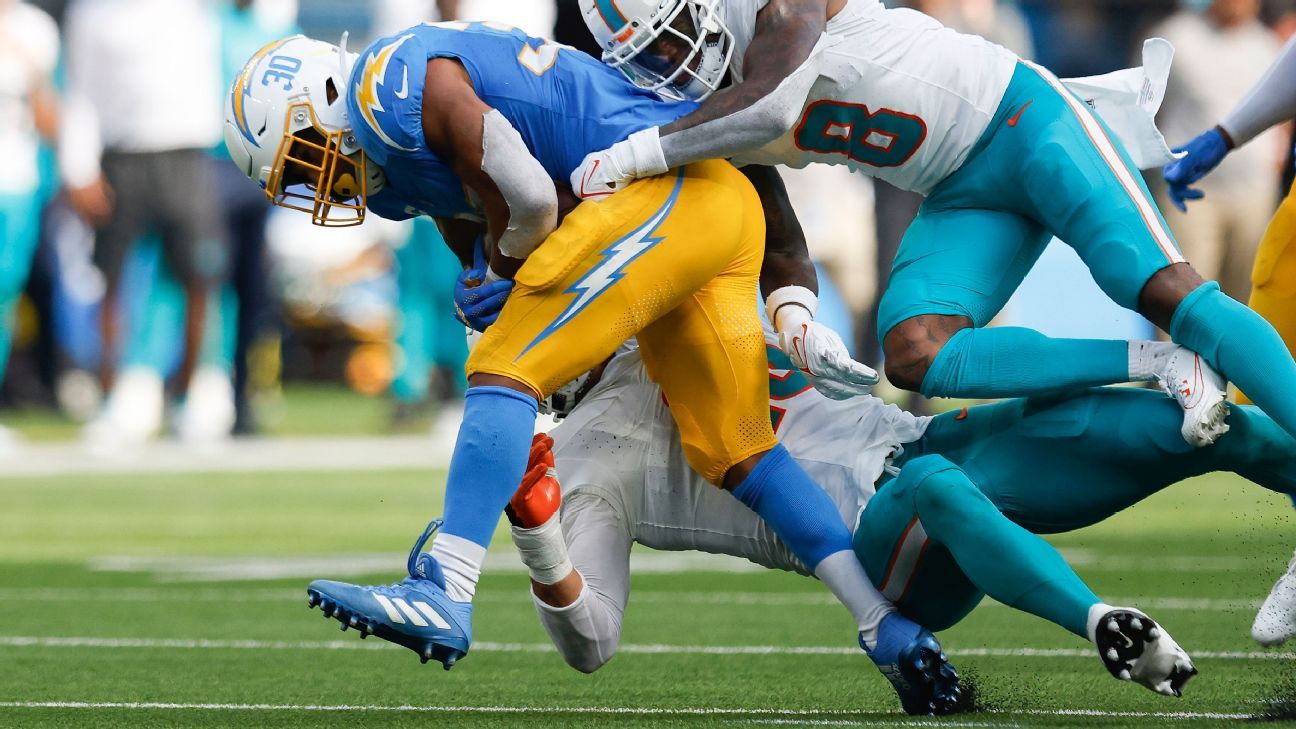 Chargers running back Joshua Kelley scrambles in the second