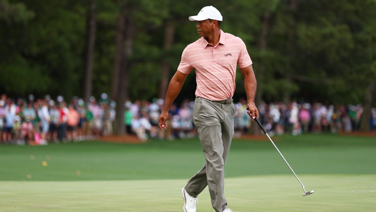 Tiger Woods is 1 under at the Masters but faces a 23-hole test on Friday