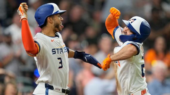 José Altuve celebrates with Jeremy Peña