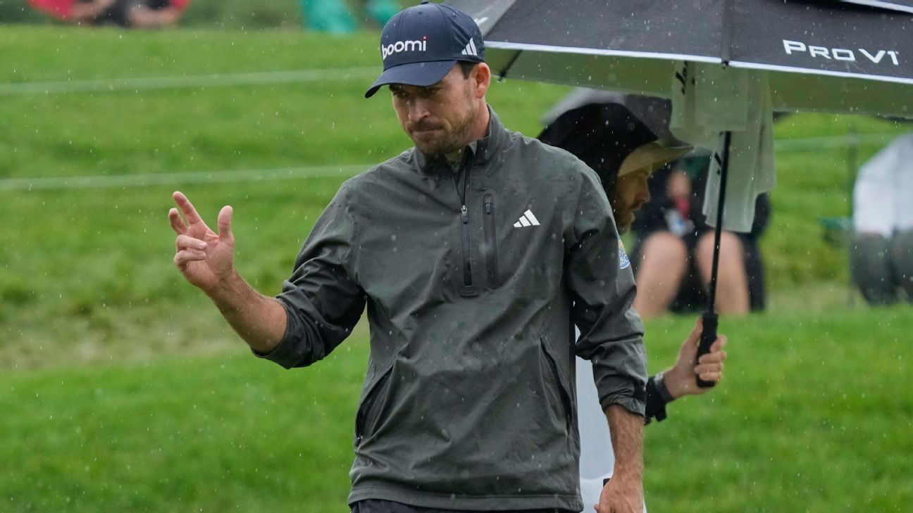 Taylor overcomes rain, atop Memorial with Griffin