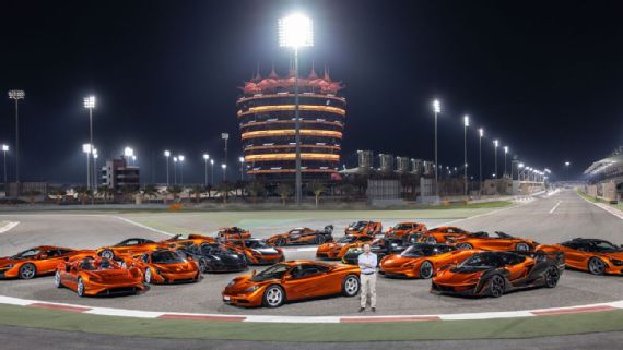 Collection of 20 orange McLaren cars displayed.