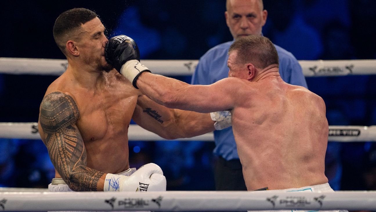 Paul Gallen punches Sonny Bill Williams in the face.