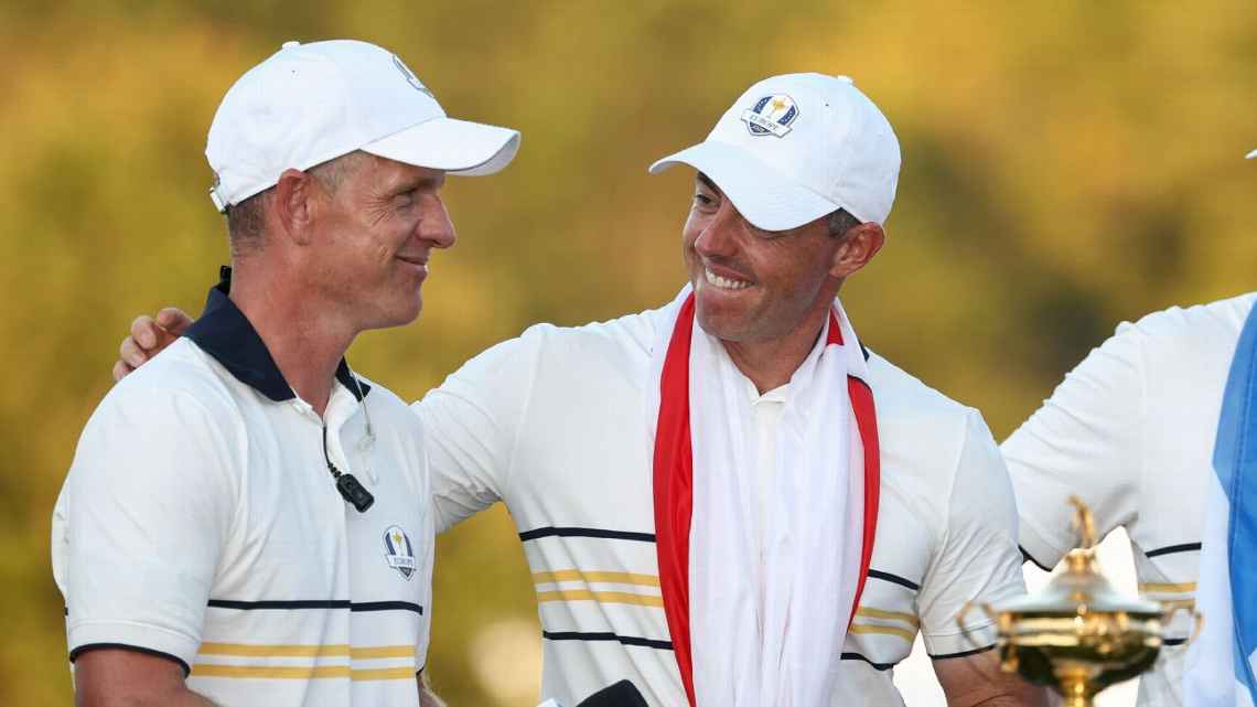 Luke Donald and Rory McIlroy celebrating