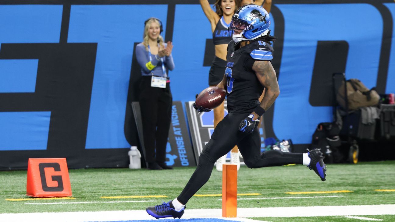 Jahmyr Gibbs celebrando tras anotar un touchdown