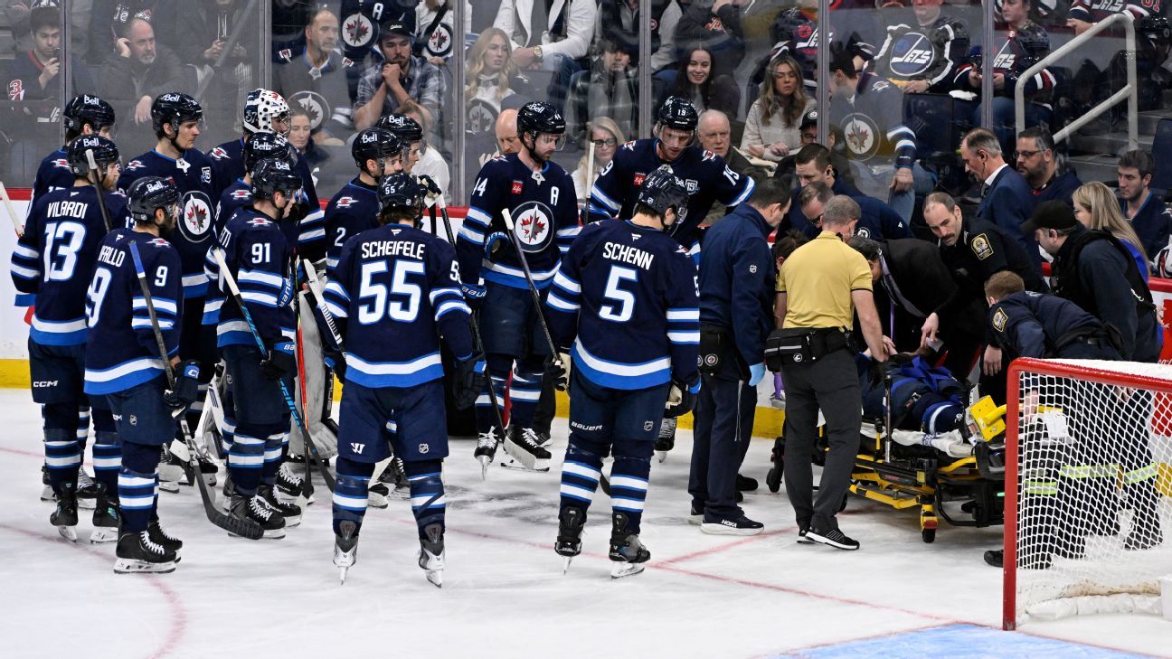 Jets D Fleury leaves on stretcher after collision