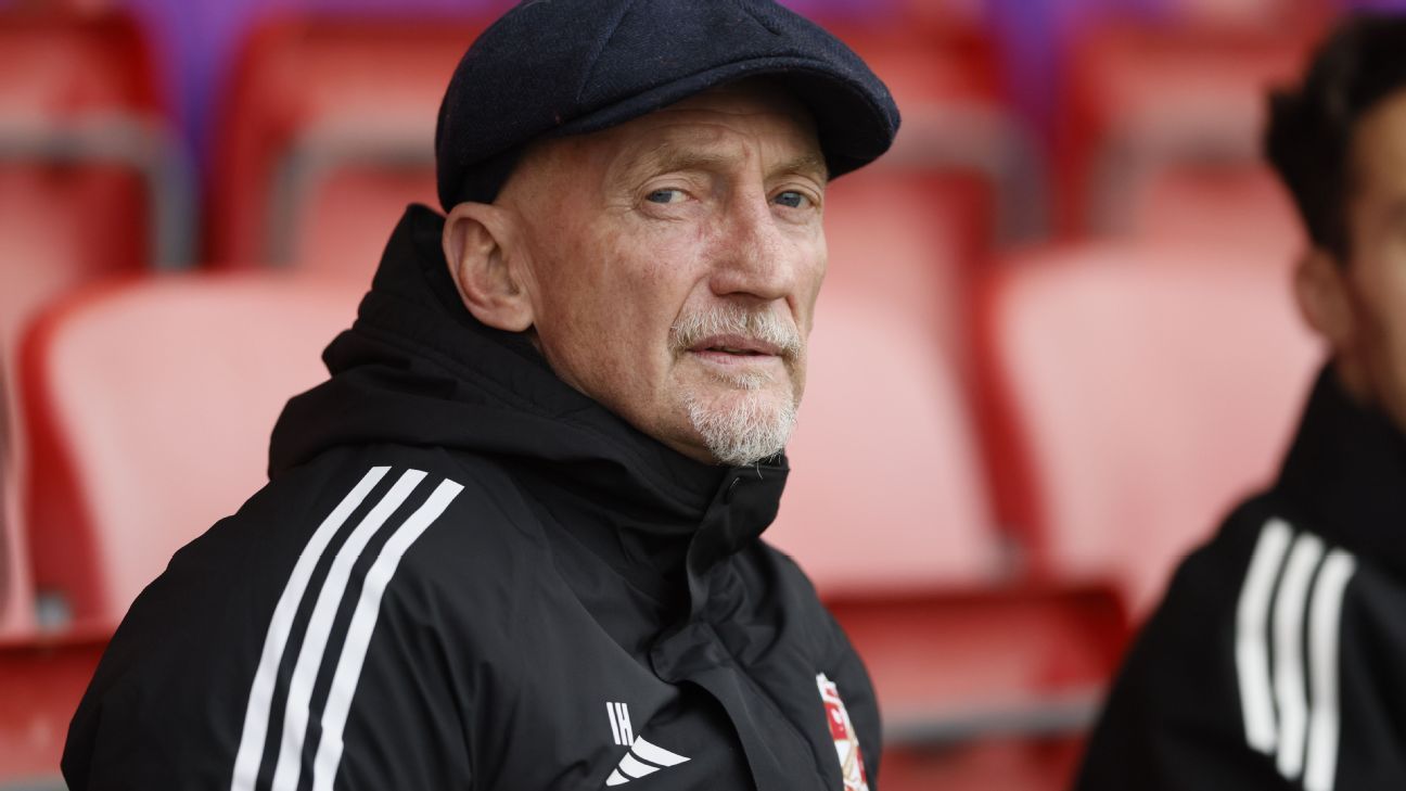 Ex-PL coach Holloway slams football boss 'cowards'...