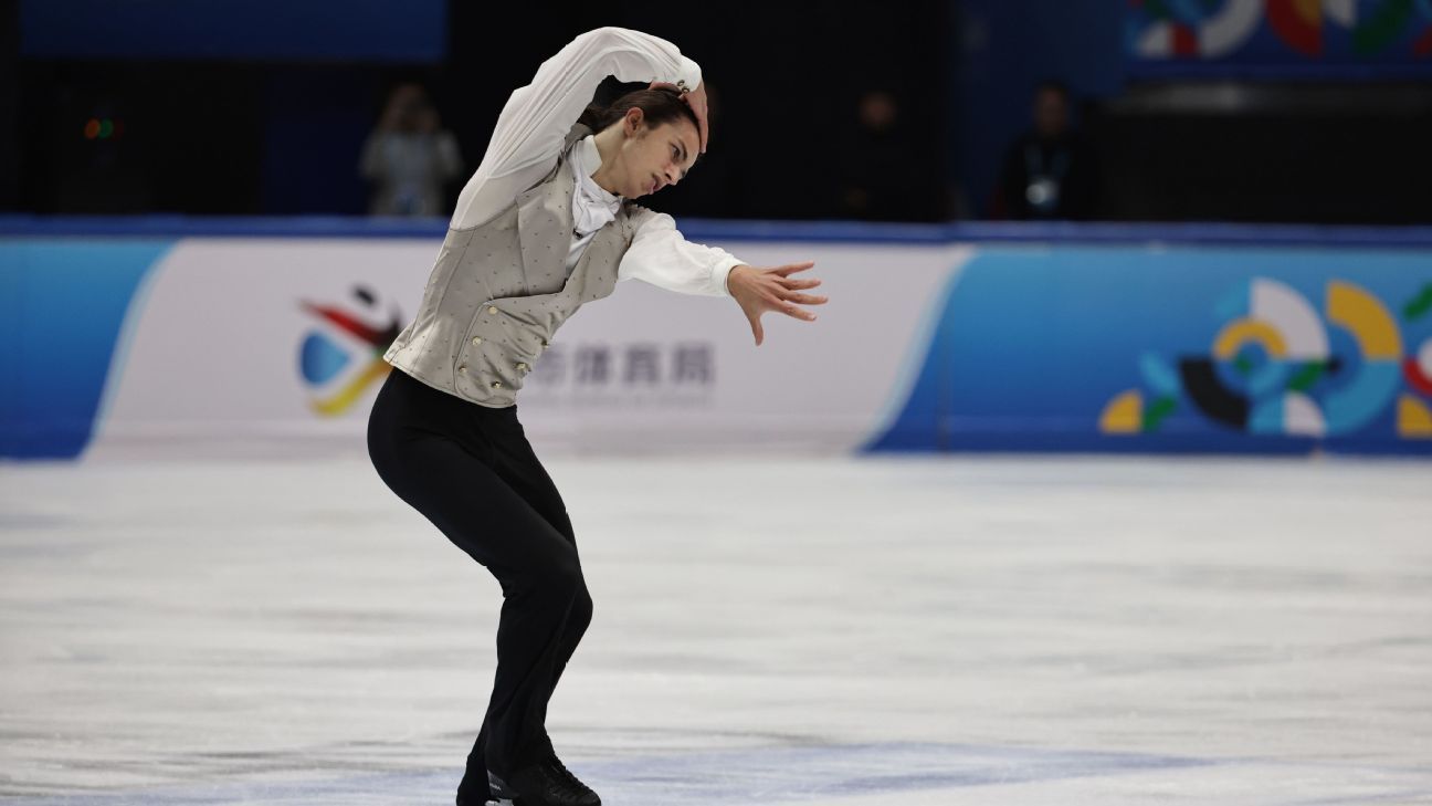 Russian figure skater spins new tune over rights