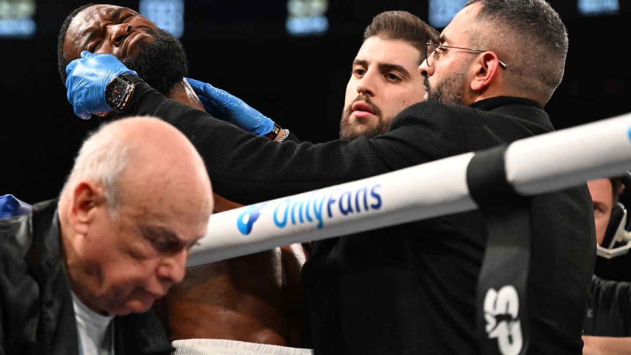 Boxer George collapses in corner, exits on stretcher