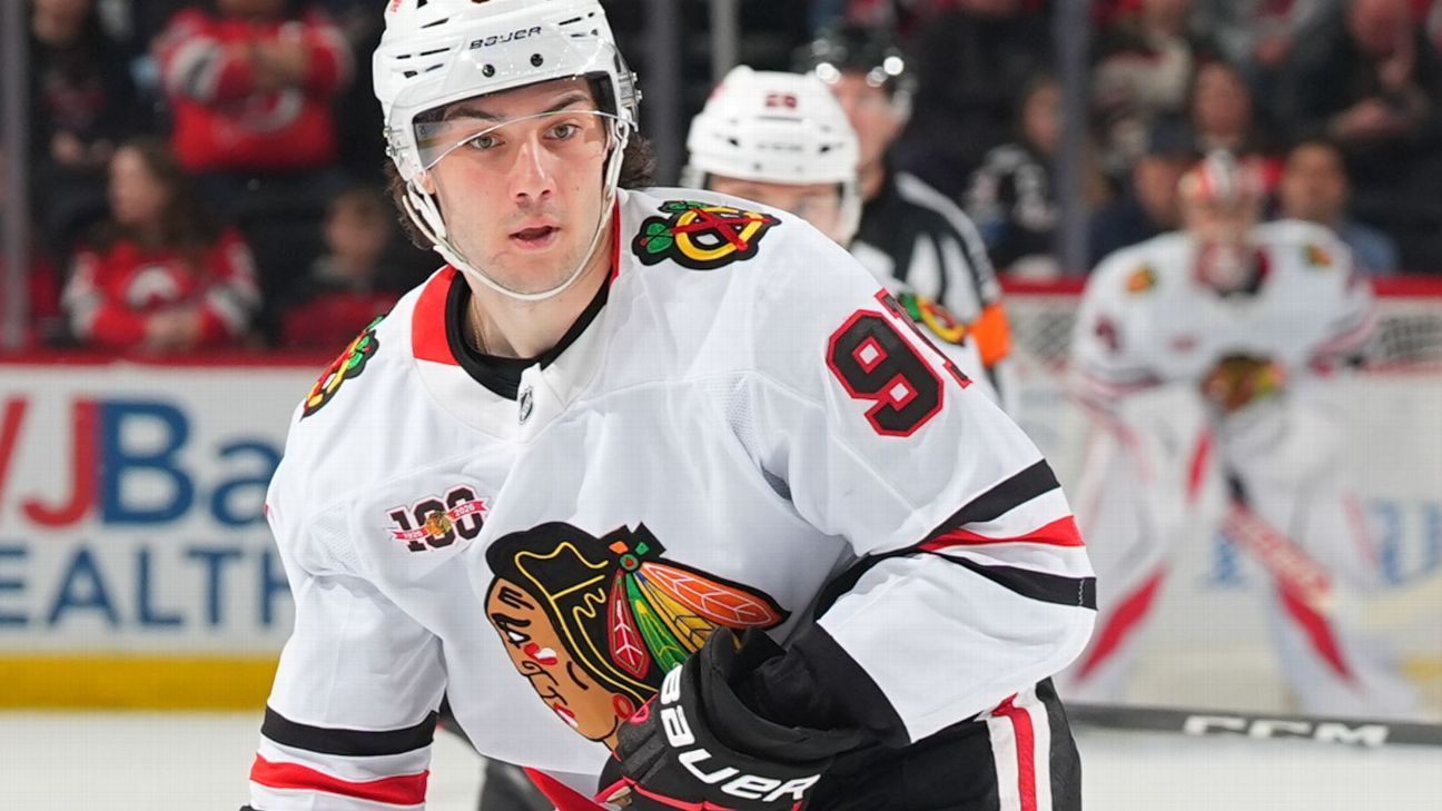 Blackhawks' Nazar to wear cage after losing teeth