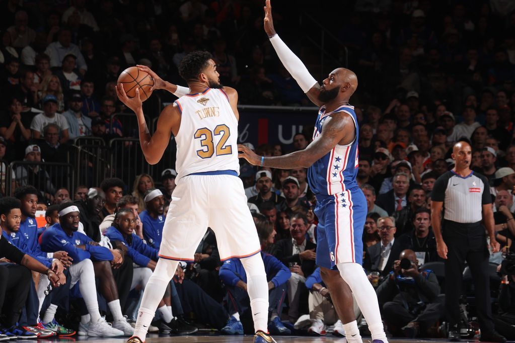 Sixers rally in LeBron's debut, spoiling Knicks' championship celebration