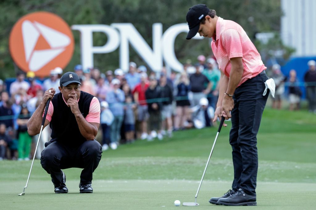Tiger Woods and son hobble to a 59, two back of Team Thomas
