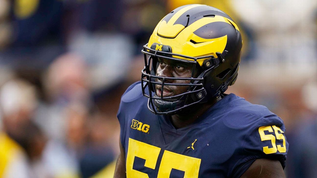 Through triumph and tragedy, Michigan's Olu Oluwatimi became the nation's top lineman