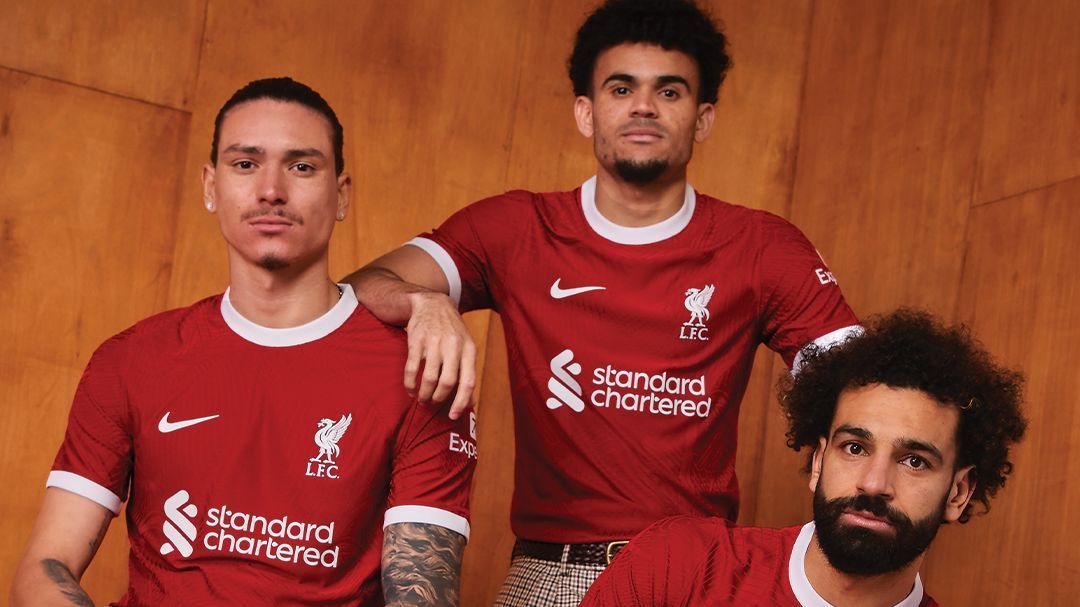 Liverpool stars don flares and go back to the ’70s to unveil new home kit