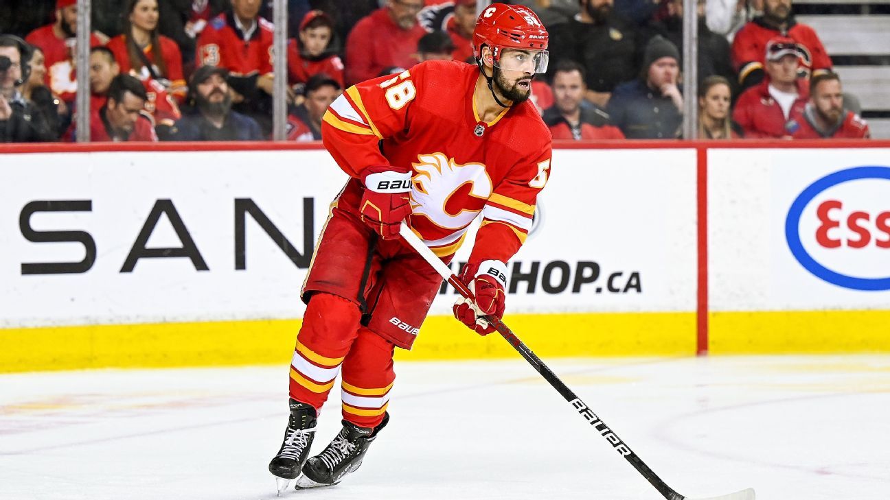Flames' Kylington in 'good place,' returns to ice